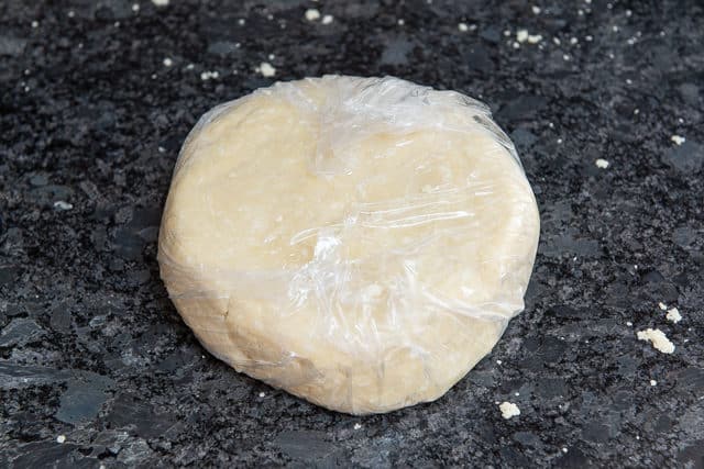 Pie Dough Wrapped in Plastic in Disk Shape