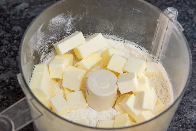 Cubed Butter Added to Food Processor Bowl
