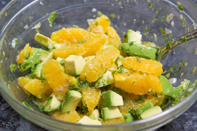 Orange Segments, Jalapeno, Herbs, and Shallot, Avocado Salad in Glass Bowl