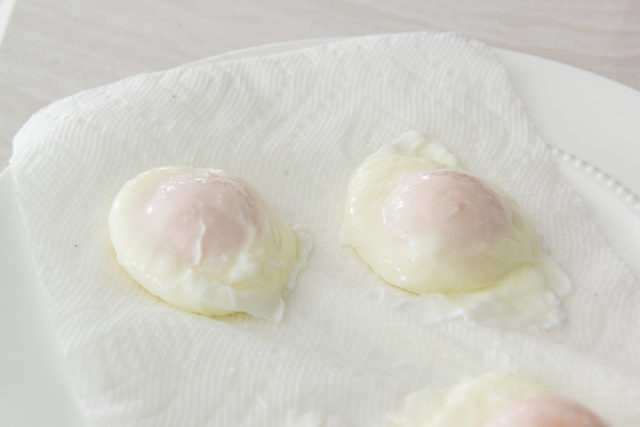 Poached Eggs - on a Paper Towel Lined Plate to Soak Up Moisture