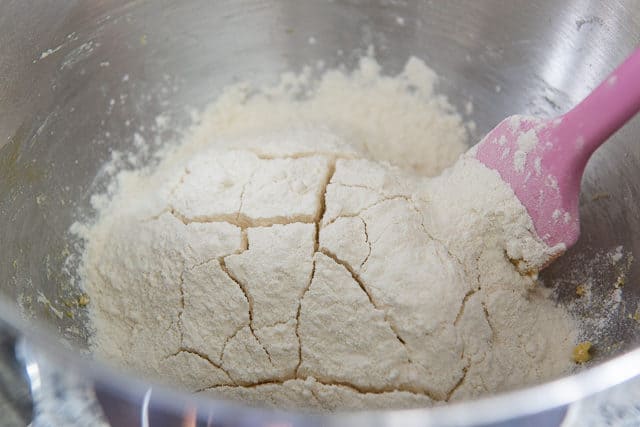 The flour cracked as the sponge rises from the yeast