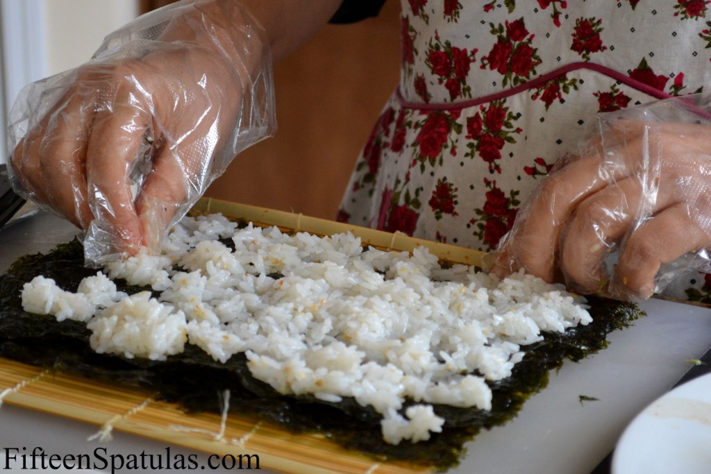 Spreading Rice onto Seaweed Paper