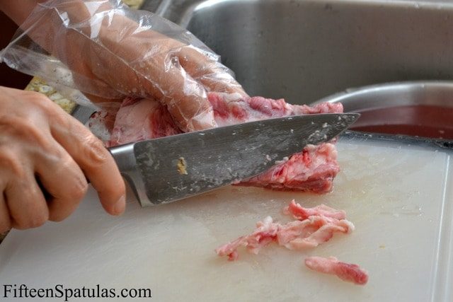 Trimming Fat from the Short Ribs with a Knife