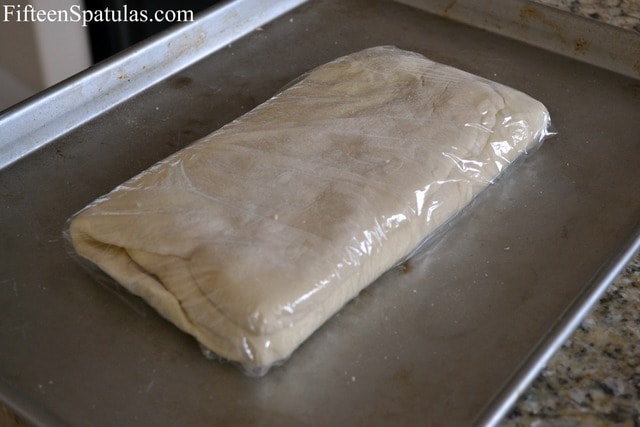 Tri-Folded Puff Pastry Dough Wrapped in Plastic Wrap to Rest