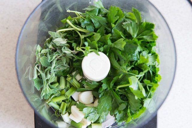 Green Herbs and Scallions in Food Processor bowl