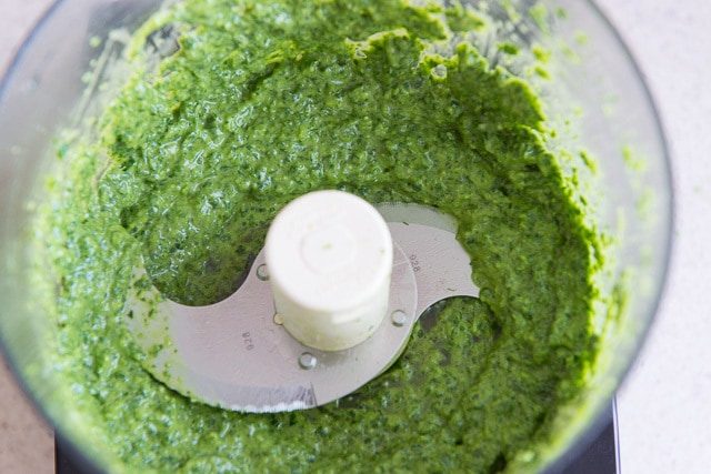 Saucy Green Herbs and Scallions in Food Processor bowl