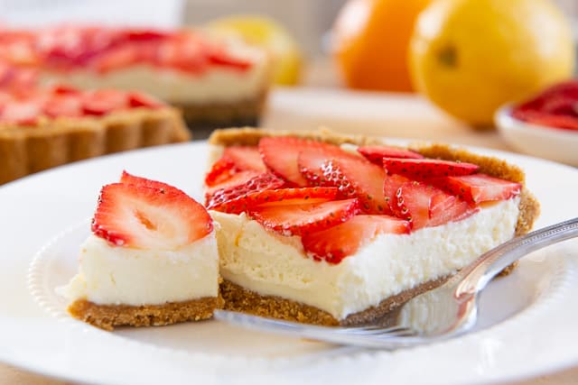 No Bake Tart - Closeup View With Graham Base, Mascarpone Filling, and Fresh Strawberries Visible