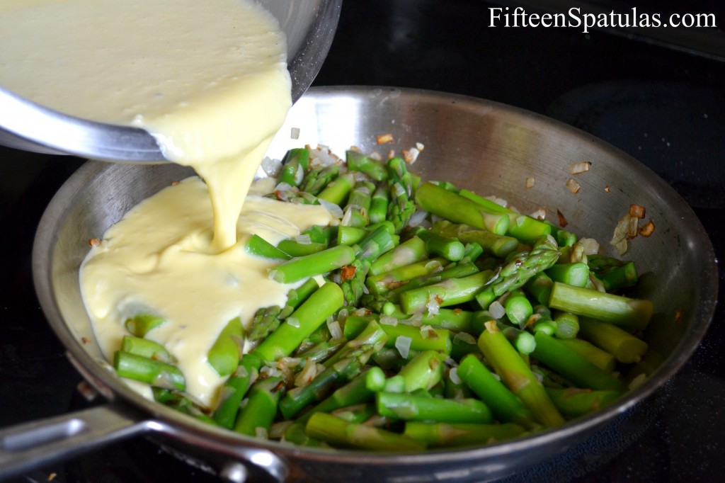 Pouring the Egg Mixture onto the Asparagus