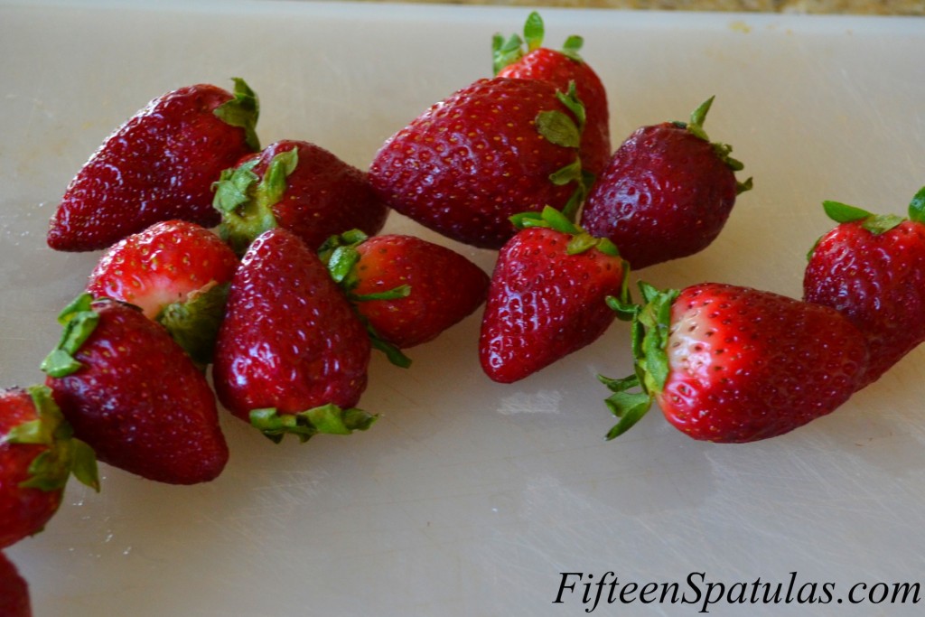 Strawberries with Stems on Cutting Board