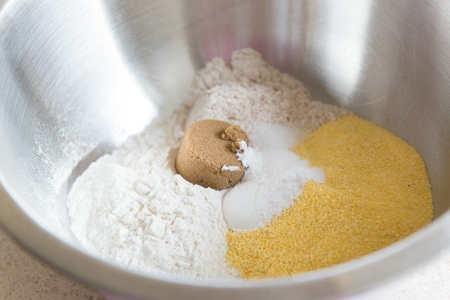 Flour, Cornmeal, Brown Sugar, and Dry Ingredients in Mixing Bowl