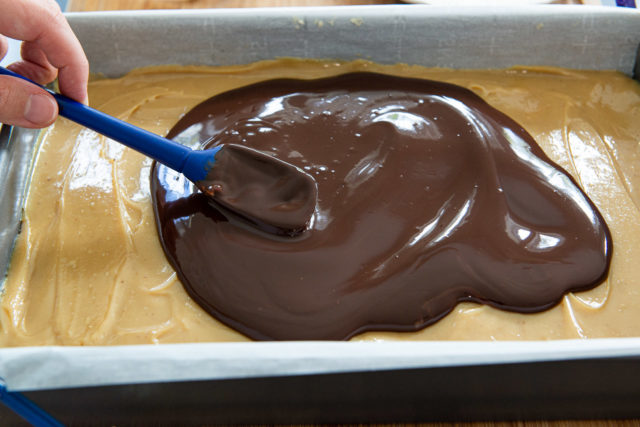 Spreading Quick Chocolate Layer On Top of Dulce de Leche