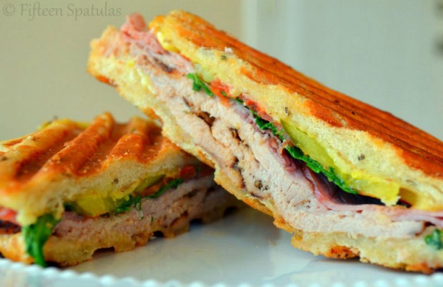 Homemade Cuban Sandwich - Sliced in Half to show Rubbed Pork Tenderloin and Filling