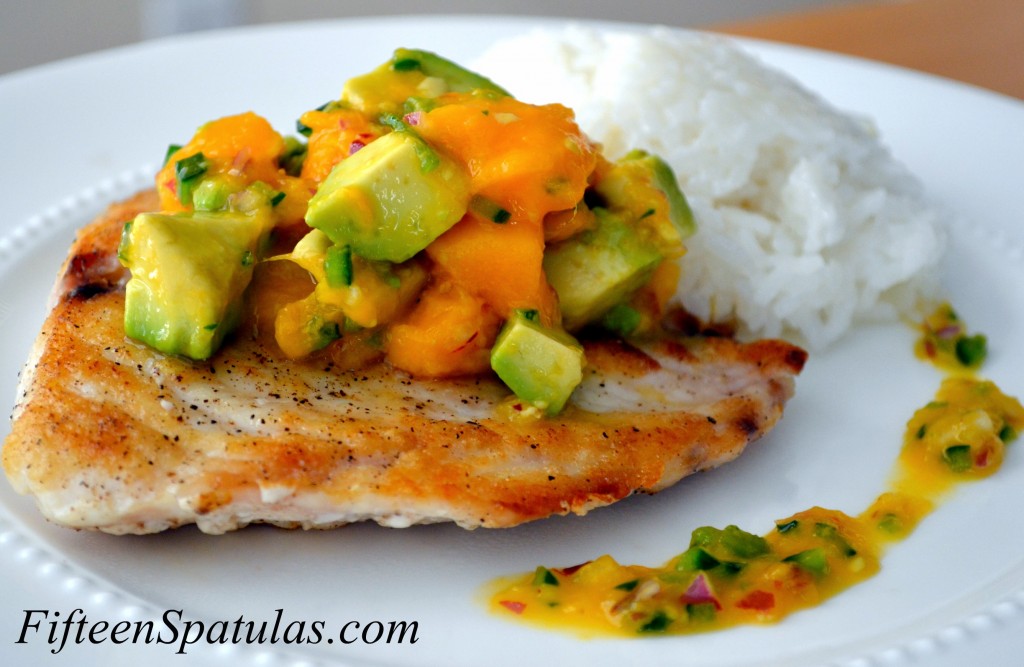 Seared Snapper - On a Plate with Mango Avocado Salsa on top and Rice in Background