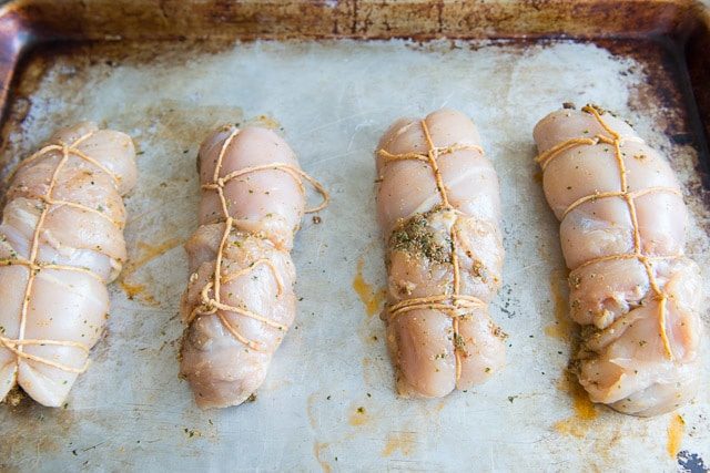 Rolled and Tied Stuffed Chicken Breasts on Sheet Pan