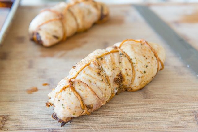 Oven Roasted Stuffed Chicken Breasts on Cutting Board
