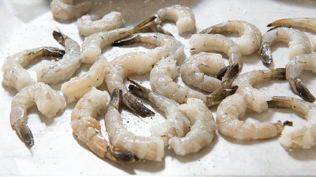 Raw Tailed Shrimp Seasoned with Salt and Pepper