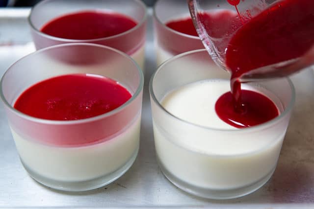 Pouring the Raspberry Gelee over the Set Panna Cotta
