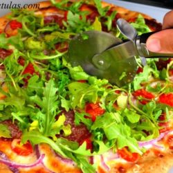 Soppressata Pizza - Cutting a Slice With Pizza Cutter