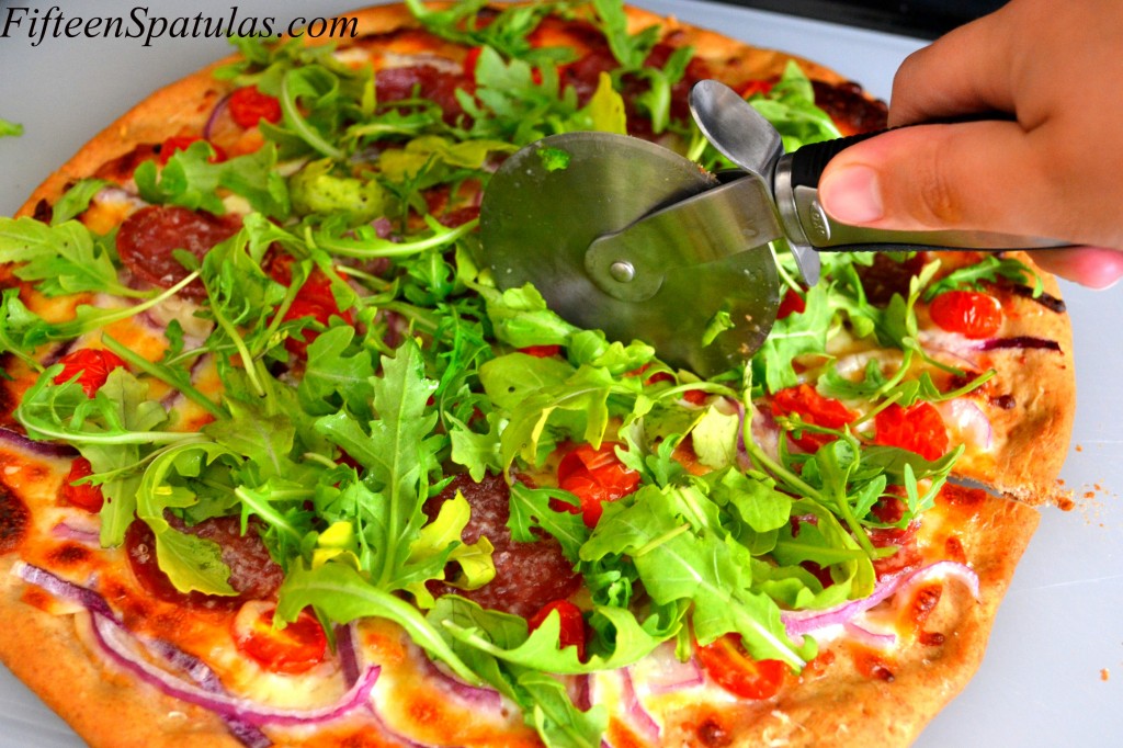 Soppressata Pizza - Cutting a Slice With Pizza Cutter