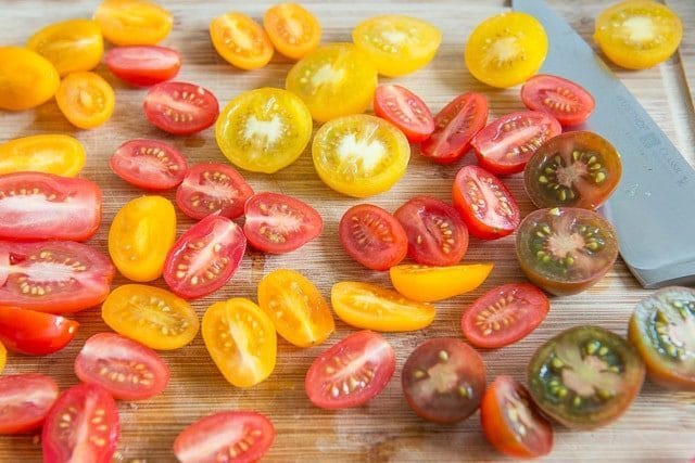 Cut Heirloom Grape and Cherry Tomatoes on Wooden Board