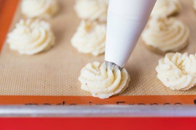 Piping Mashed Potatoes onto Silicone Mat