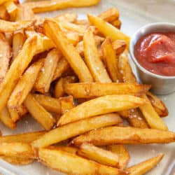 Homemade French Fries On Sheet Pan with Ketchup