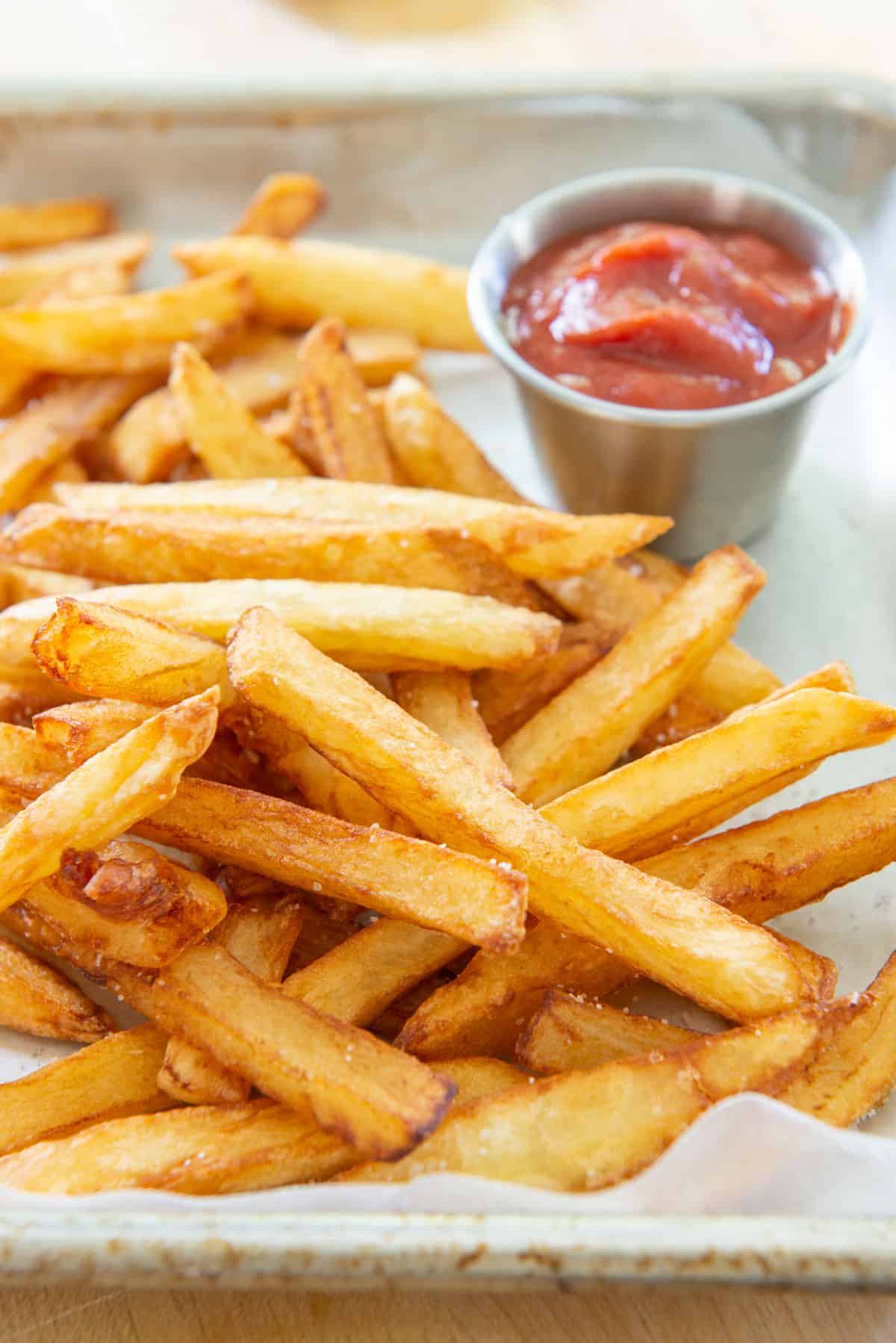 A Pile of French Fries On a Tray