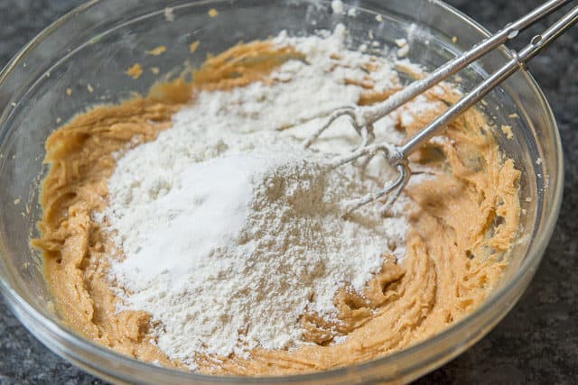 Adding Flour to Wet Ingredients in Bowl