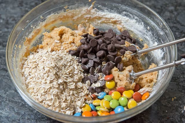 oats, Chocolate Chips, and Chocolate Candies Added to Dough Bowl