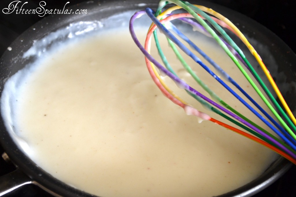 Thickened Souffle Base in Pan with Rainbow Whisk