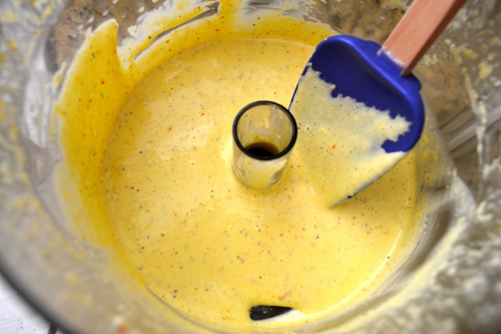 Rich Yellow Aioli in Food Processor Bowl with Blue Spatula