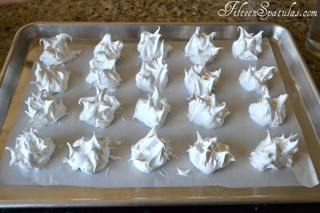 Dollops of Stiff Meringue on Parchment Paper with Peaks