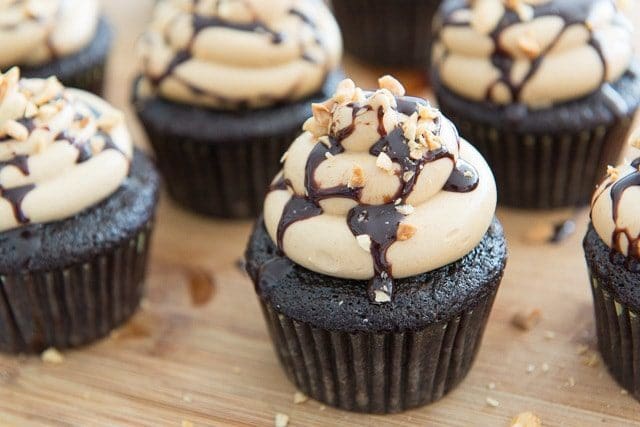 Chocolate Cupcake Recipe - with Peanut Butter Frosting on Top of Wood Board
