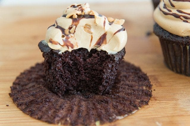 Chocolate Cupcake with Bite Taken to Show Fluffy Interior