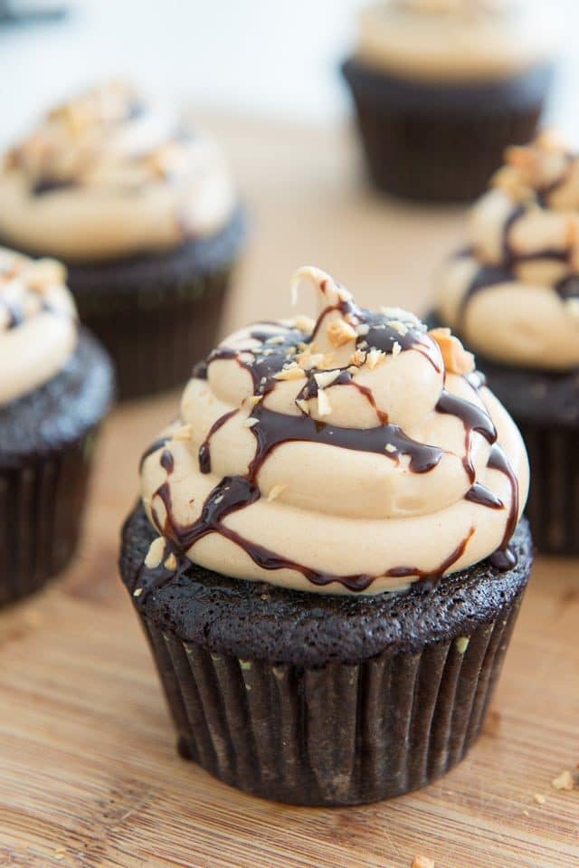 Chocolate Peanut Butter Cupcakes - with Chocolate Syrup Drizzle and Chopped Peanuts On top