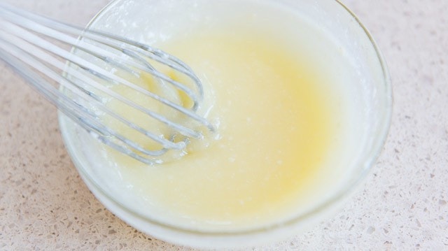 Cream Cheese Frosting in Bowl with Whisk