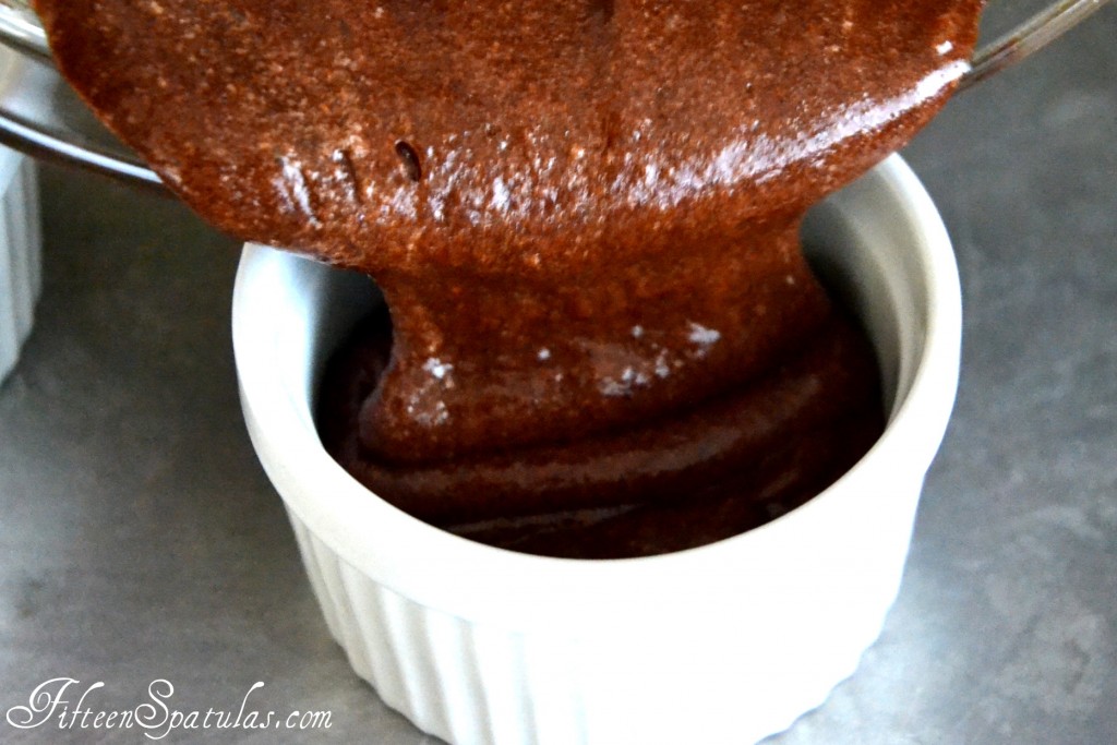Pouring Chocolate Pudding Mixture into White Ramekin