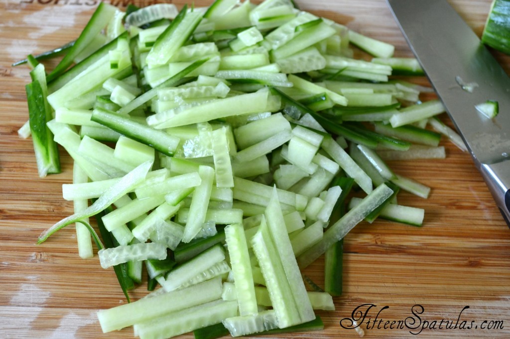 Cut Cucumber Sticks on Cutting Board