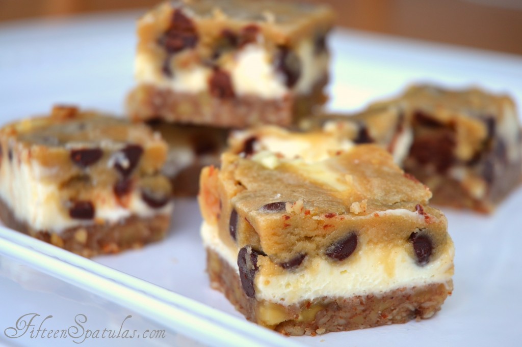Cookie Dough Cheesecake Bars Cut Into Squares on White Platter