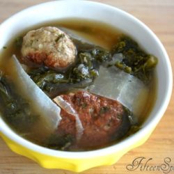 Meatball Soup - In Yellow Bowl with Kale and Pecorino Shavings