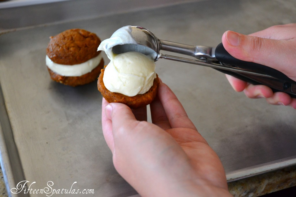 Scooping Cream Cheese Filling onto Baked Whoopie Pie Halves