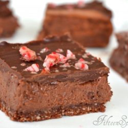 Chocolate Cheesecake Bars with Candy Cane Sprinkled on Top