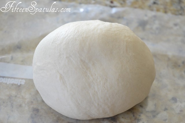 Raw Dough Ball on Wax Paper