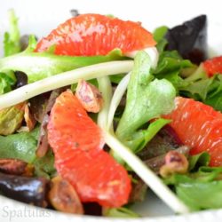 Orange Pistachio Salad on White Plate