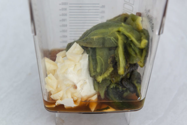 Peeled Poblano Chiles in a Blender with Cream Cheese, Chicken Stock, Garlic