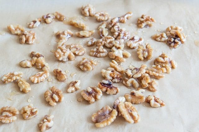 Candied Walnuts with honey Spread on Parchment Paper