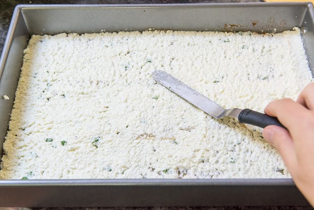 Spreading Ricotta on the No Boil Noodles with an offset spatula for World\'s Best Lasagna!