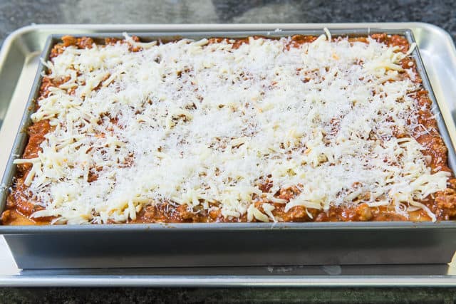 How to Make Lasagna - Layer by Layer It\'s Filled Here and Ready to Bake