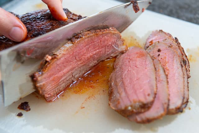 Slicing Oven Roasted Tri Tip on Cutting Board