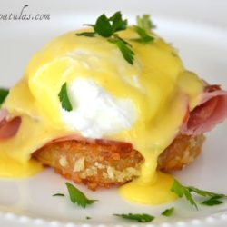 Fried Green Tomato Eggs Benedict - On White Plate Sprinkled with Parsley